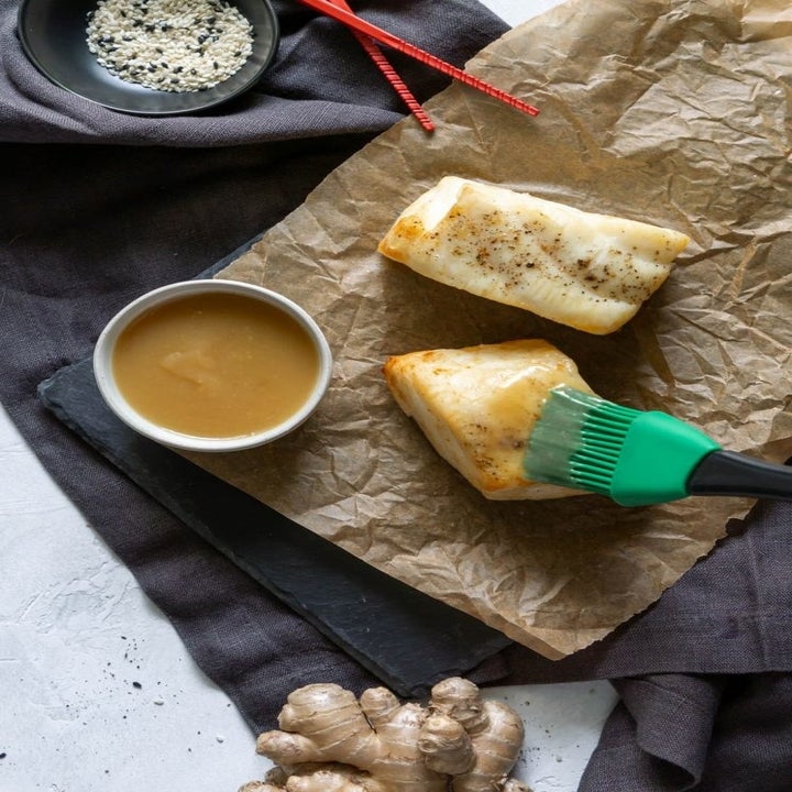Marinating sea bass with miso sauce.